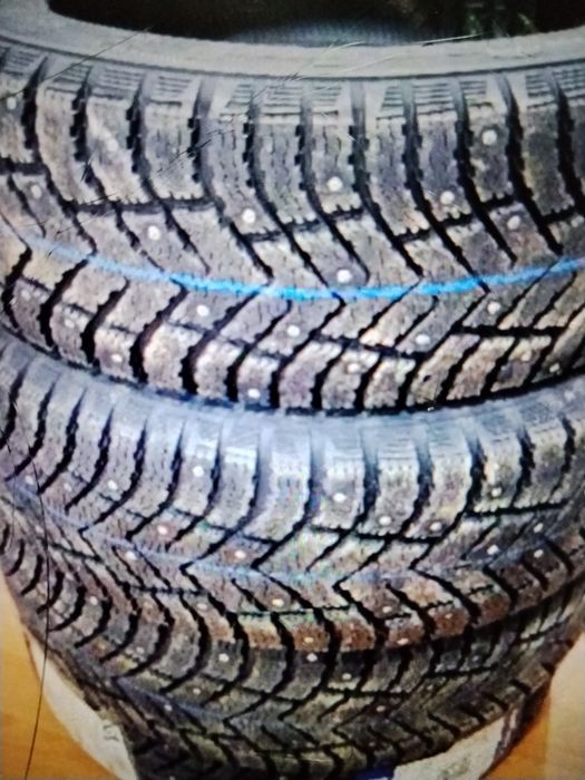 Продам новые шипованые шины