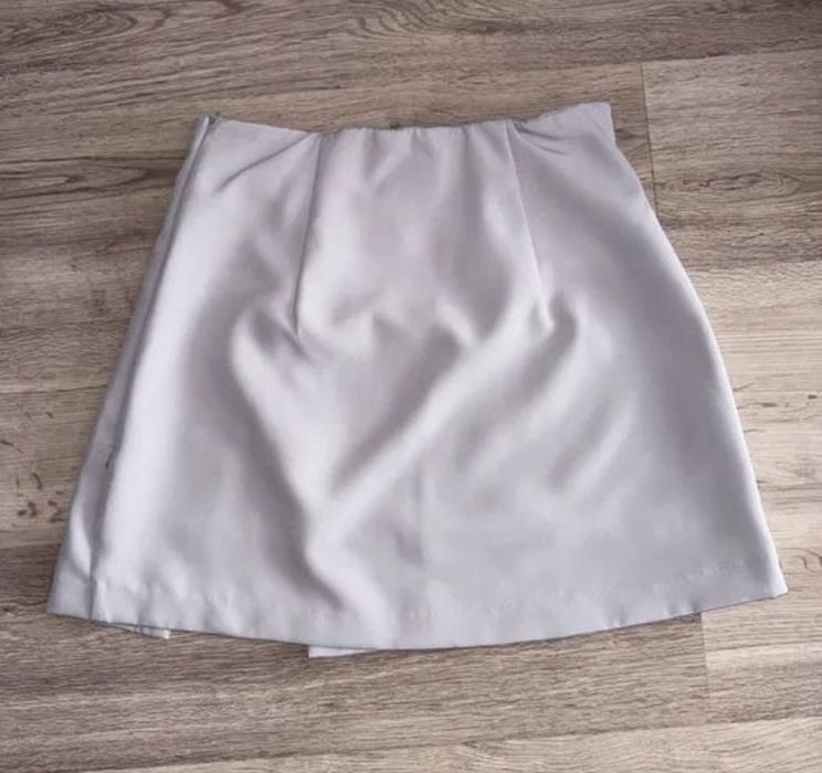 Compleu top și fustă