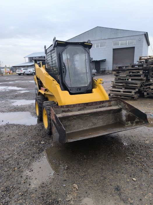 Мини погрузчик CAT 242B