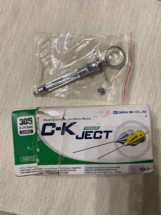 Карпульный шприц и иглы для него