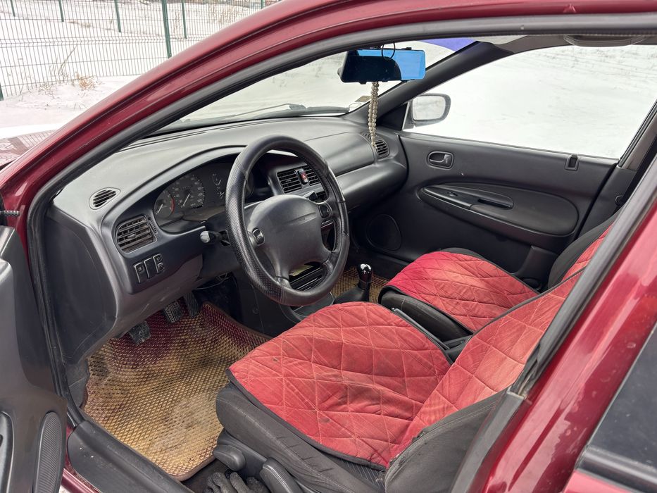 мазда 323 ba владеет женщина