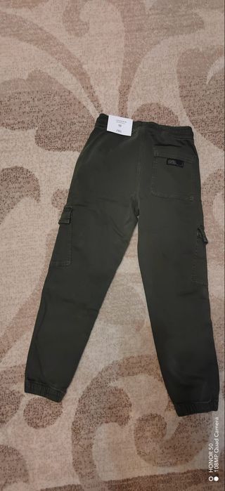Pantaloni baiat stil cargo  numărul 140 ,