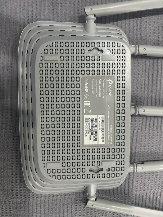 Это Wi-Fi роутер TP-Link Archer C60