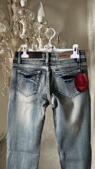 Джинсы новые