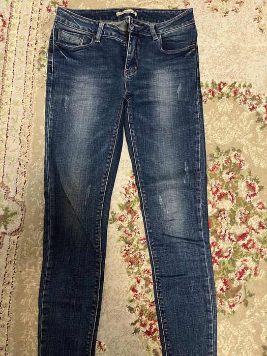 Джинсы женские