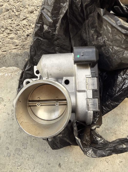 Дроселовата клапа  MAGNETI MARELLI Audi A4 B6 бензин