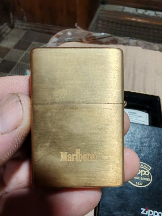 Продам зажигалку зипо