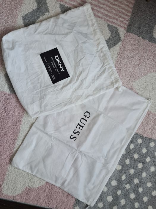Saci de depozitare genti Guess și DKNY