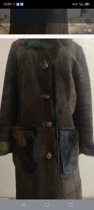 Срочно продам дублёнку черно карично света