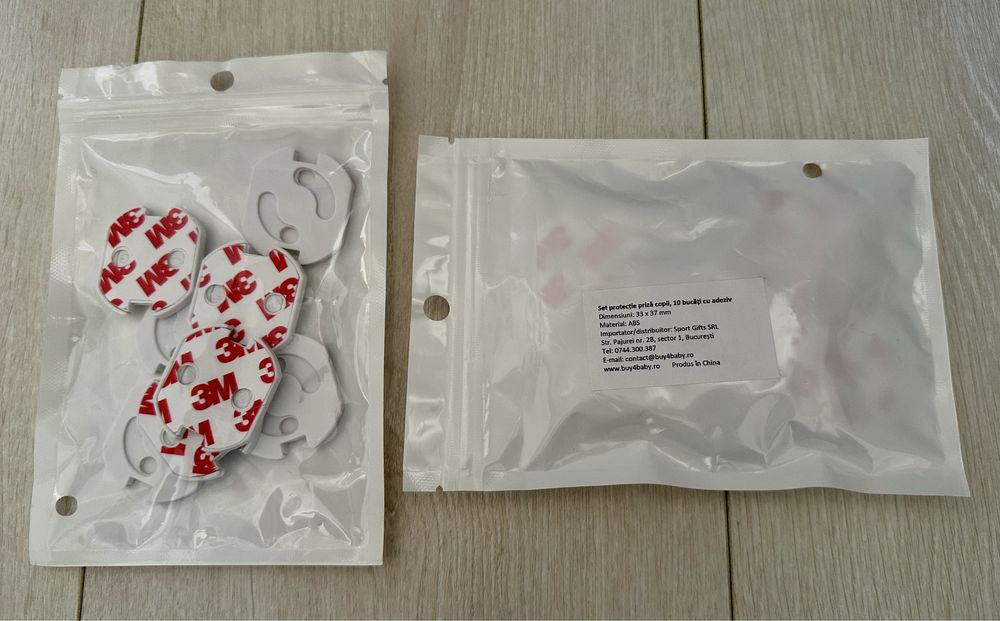 Set de 10 protecții pentru priză cu adeziv 3M, Alb