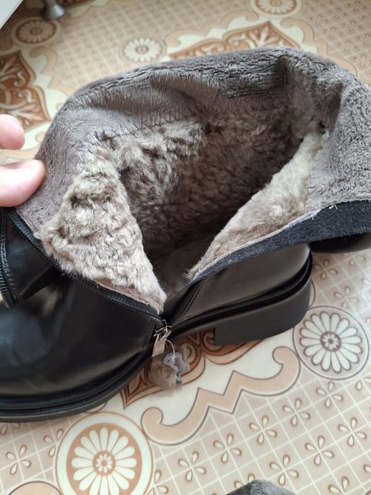 Продам новые сапоги