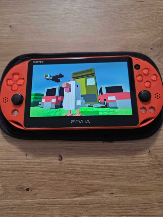 PS Vita Slim Red modat cu Sandisk Ultra 64gb impecabil cu folie