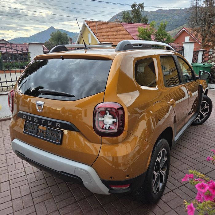 Dacia Duster 4x4 1.2 benzina 125CP Turbo~Impecabil~Prestige Orange~jante/Navi/Camera/carte service