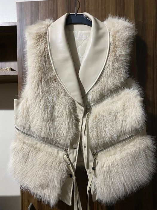 Дамски пухен елек