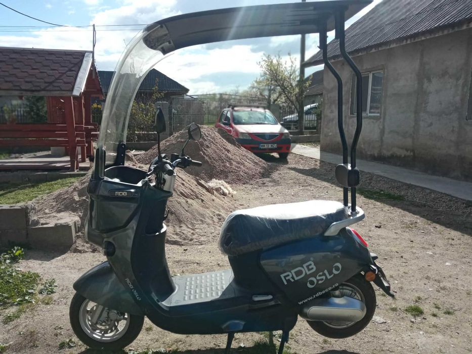scuter electric limitat la 25km/h ( nu necesita permis )
