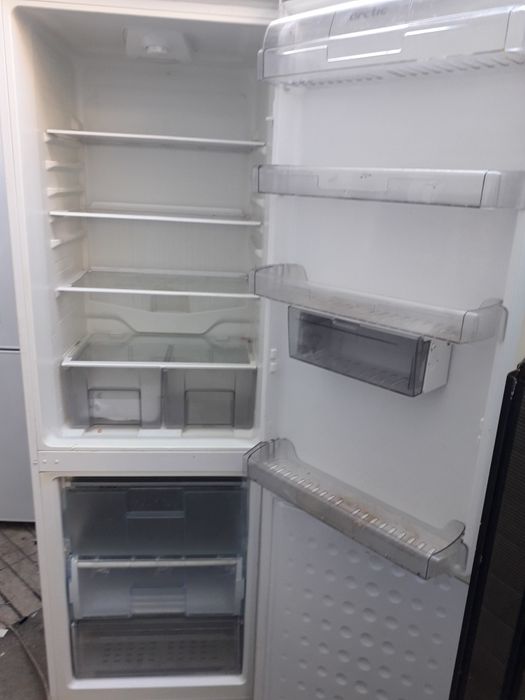 Combina frigorifica arctic indesit zanussi asigur transport