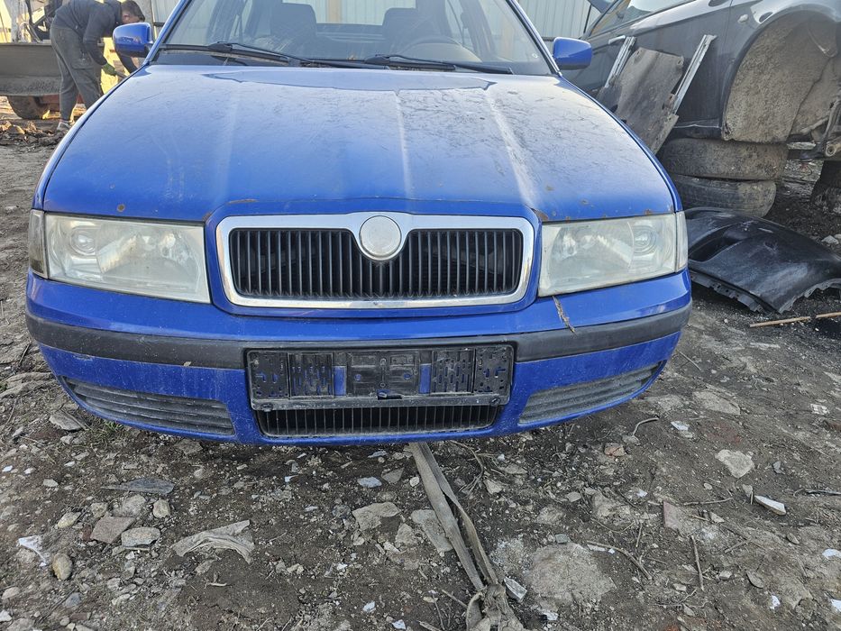 Dezmembrez Piese  skoda Octavia 1 2007 motor 1.4 BCA motor cutie roti