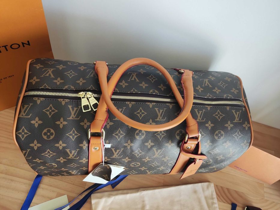 In stoc voiaj, geanta sport piele Louis Vuitton 1109.11
