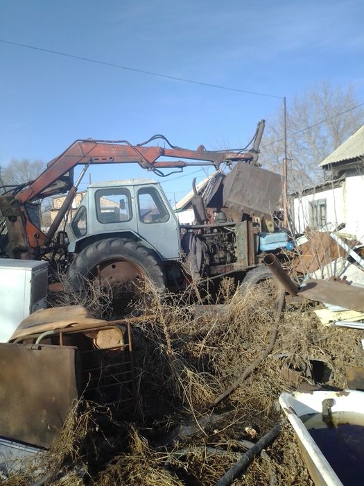 Трактор грейфер юмз