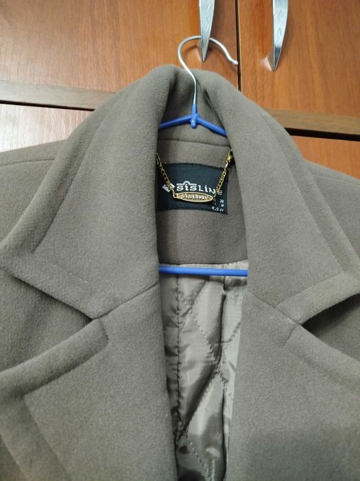 Пальто совершенно новое