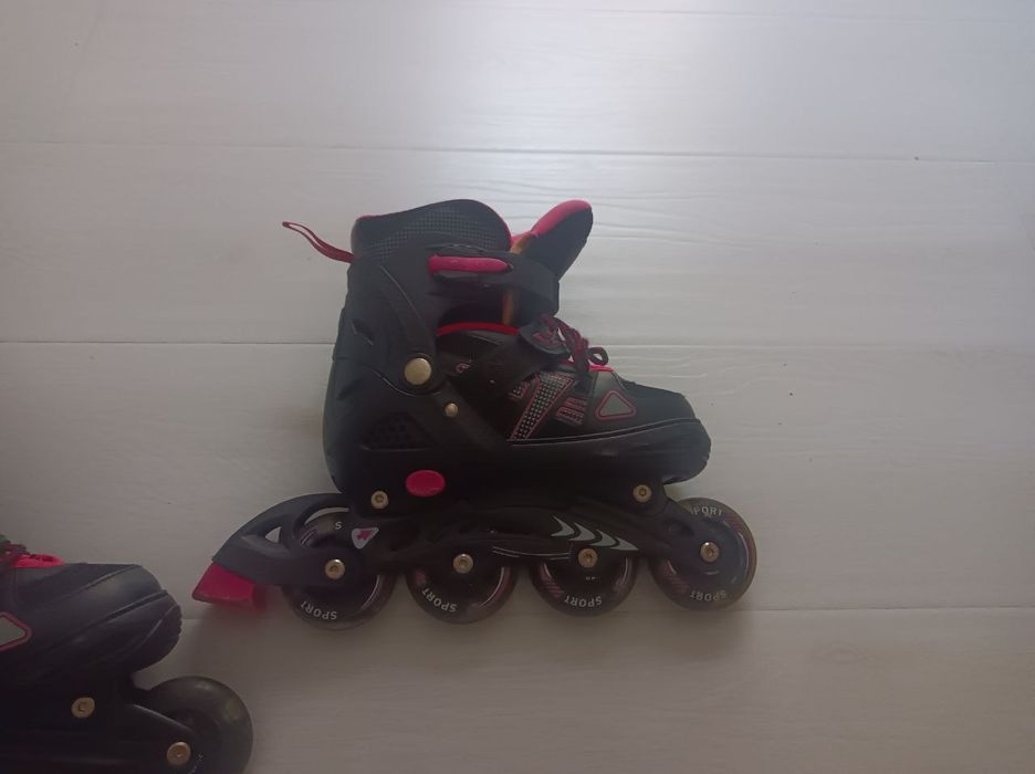 Роликовые коньки, детские, розовые.