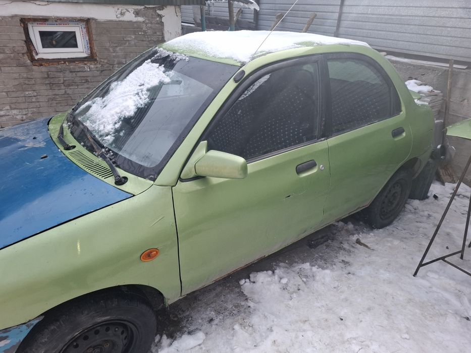 Продам  мазда  121