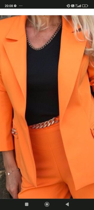 Нов костюм 44 размер