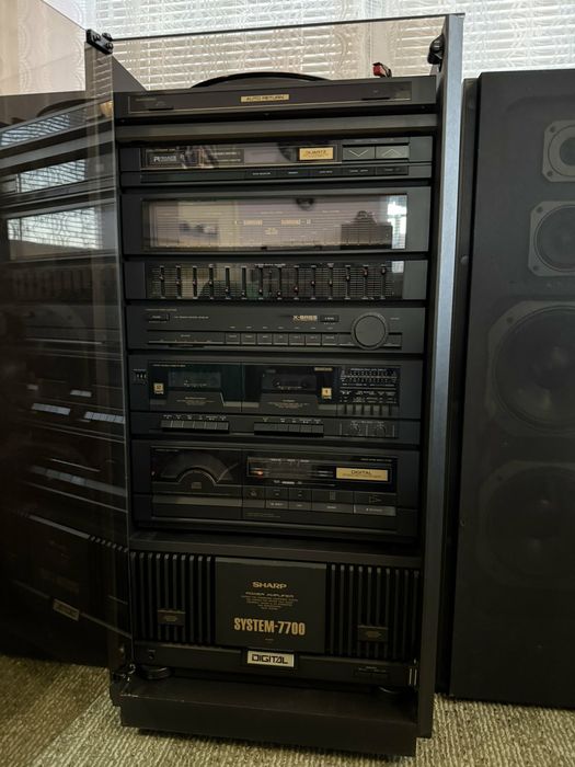 Система Sharp 7700
