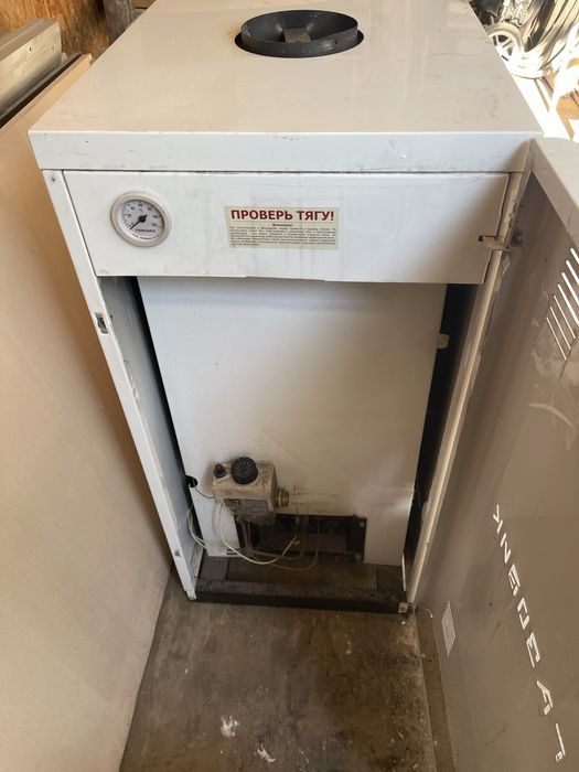 Газовый котел газовик