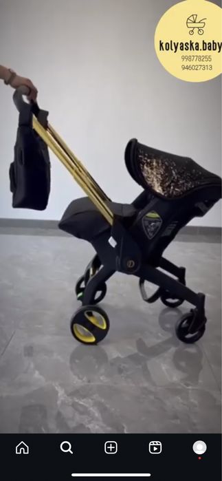 Kolyaska avtokreslo deyarli yengi