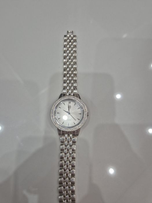 Серебрянные и стальные часы