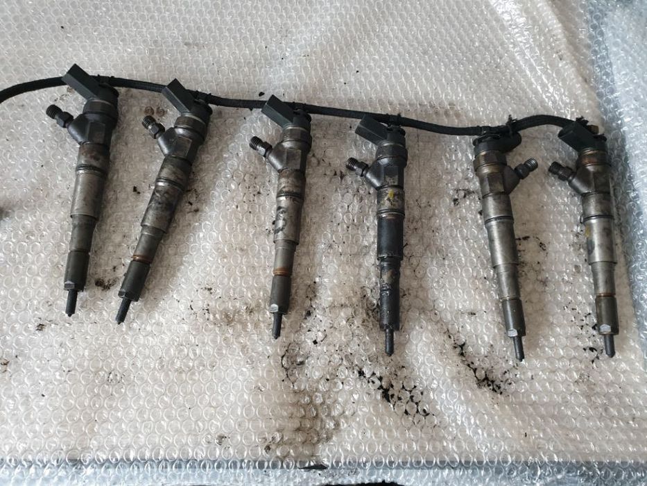 injector bmw 730 seria 7 e66 e67 e65 3.0d  7789661 0445110131