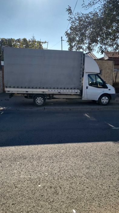 Autoutilitara Ford transit prelata
