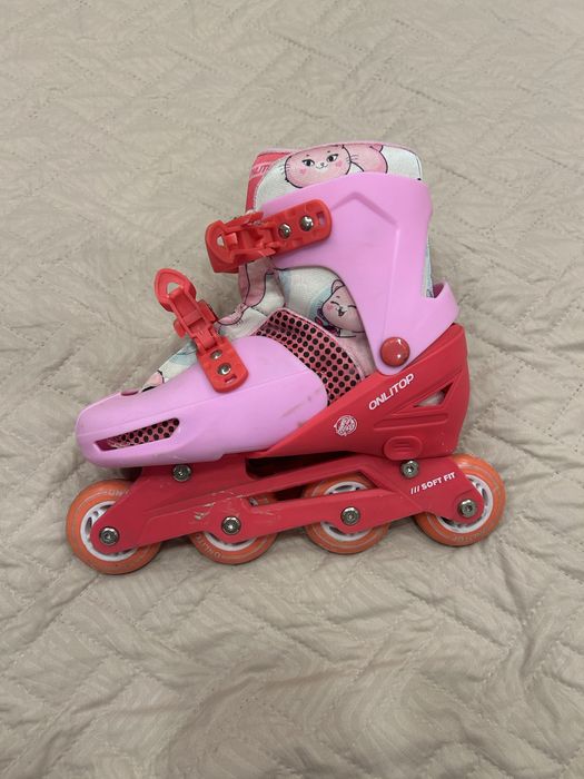 Коньки роликовые