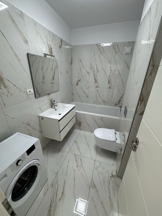 Apartament deluxe pentru inchiriere cu două camere și terasă în Giroc, modern, spațios, complet mobilat, ideal pentru confort și relaxare.