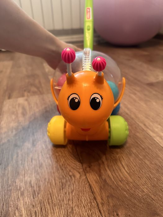 Игрушка-каталка в отличном состоянии