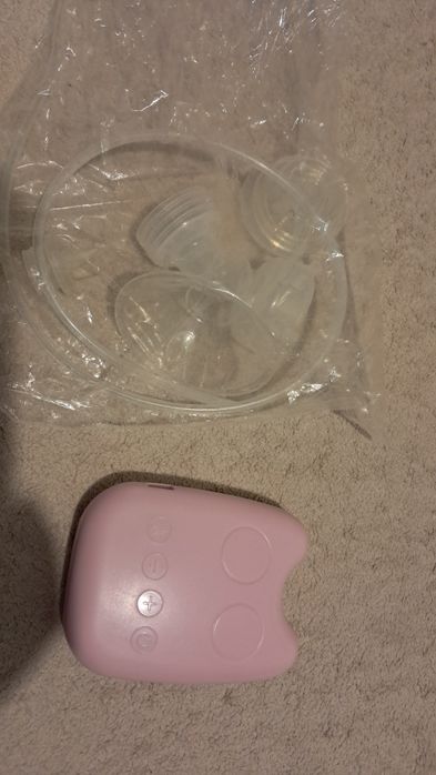 Компактный молокоотсос.