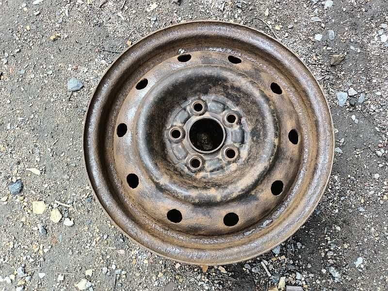 Продам ОДИН оригинальный металлический диск на автомашину Subaru