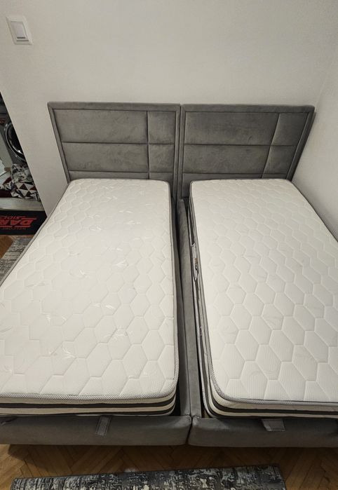 Pat de o pers cu tot cu saltea.