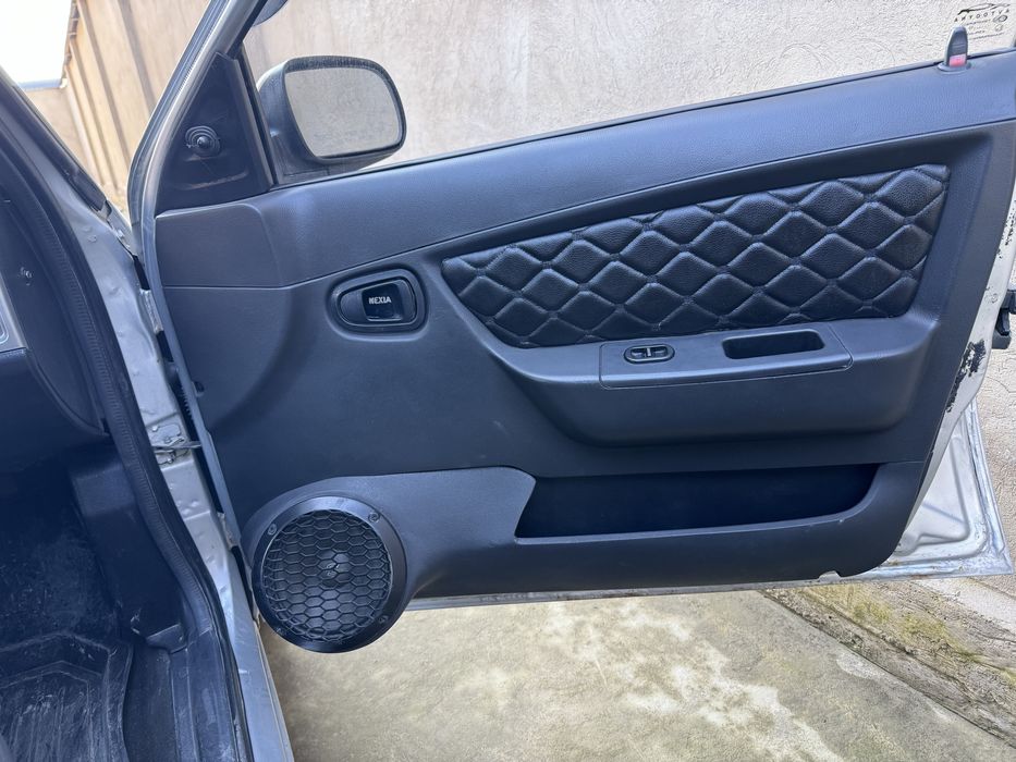 Обшивка нексия 2