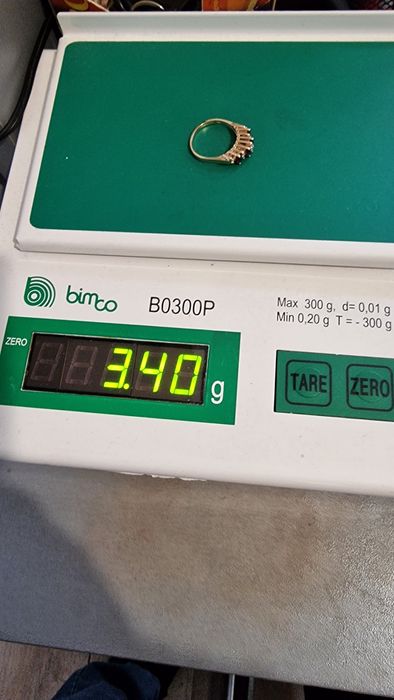 Златен пръстен с диаманти и рубини