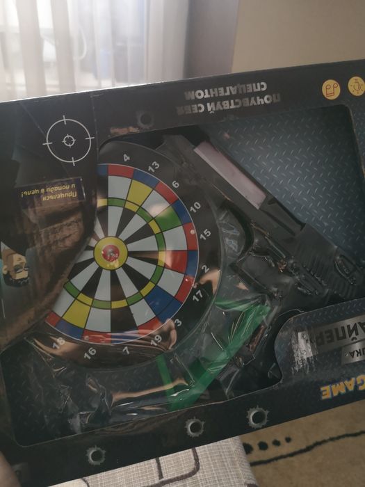 Пистолет лазер с мешенью  музыкалтной