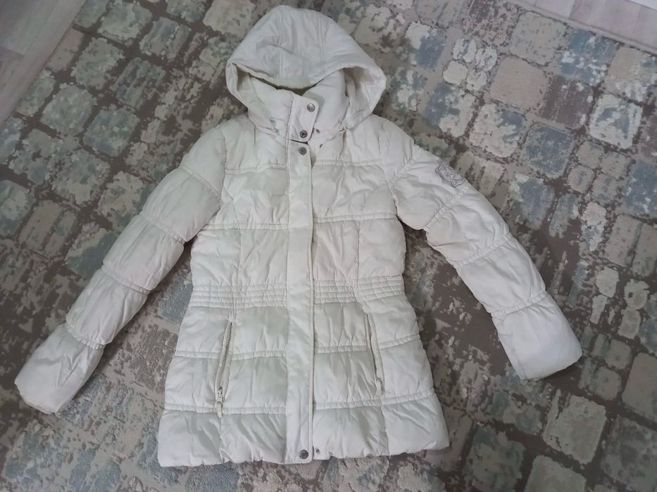 Зимние куртки.
