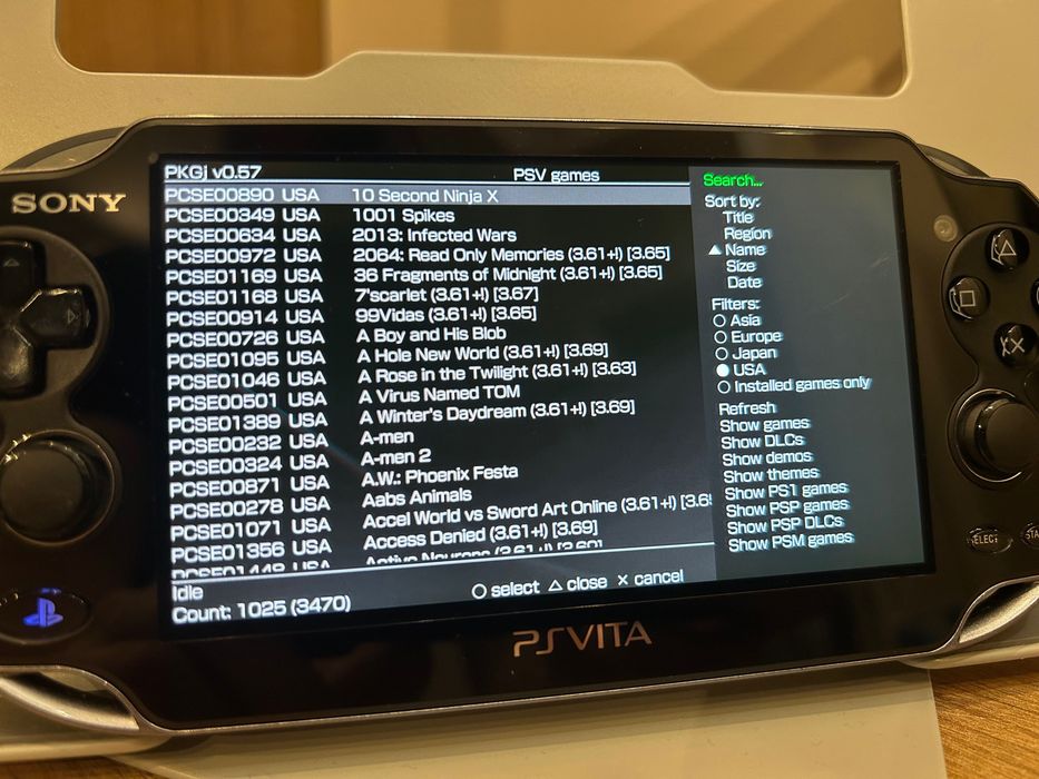 Sony PS Vita Oled – Negru  – 128GB – Modată + Jocuri