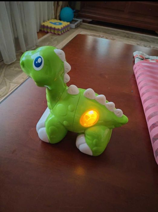 Jucarie dinozaur dansator