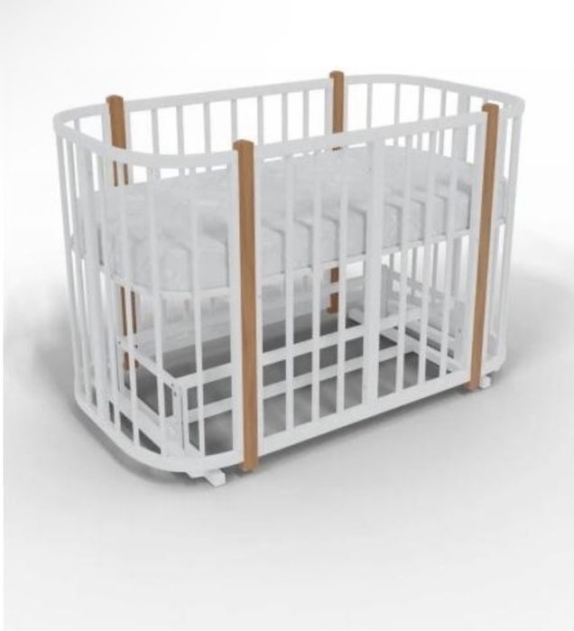 Детская кроватка с маятником