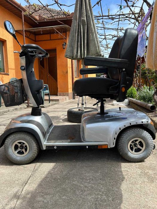 scuter carucior carut pers dizabilitati  handicap