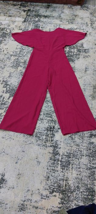 В хорошем состоянии комбинезон..