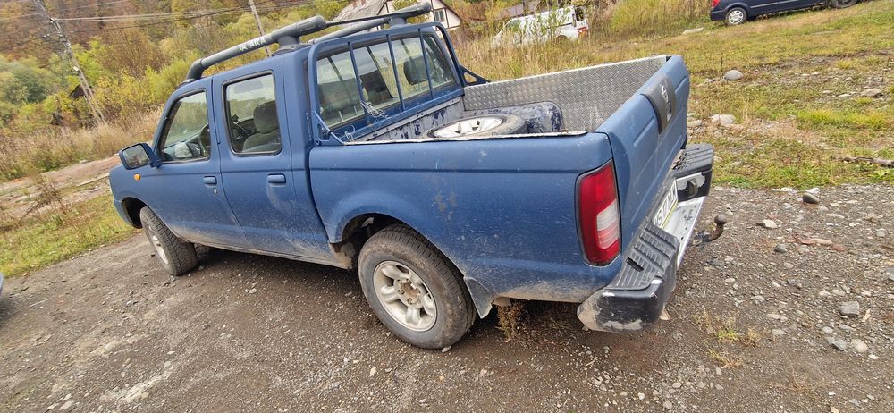 Nissan pick-up troliu  2.5 motor 4x2 an 2005