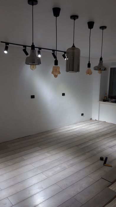 Укладка ламината,линолеума.